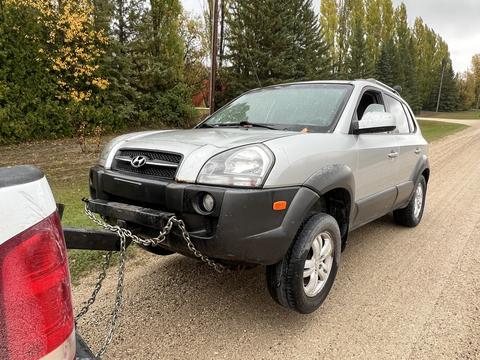 Towing a Scrap SUV for Recycling in Manitoba