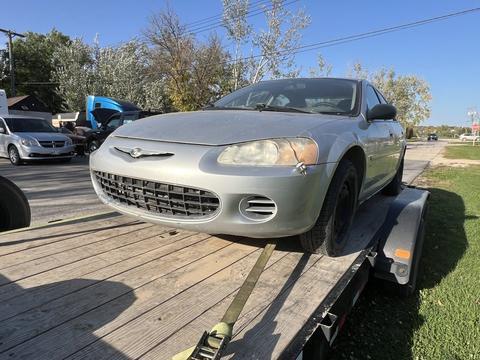Old Car Loaded on Trailer for Scrap Metal Recycling