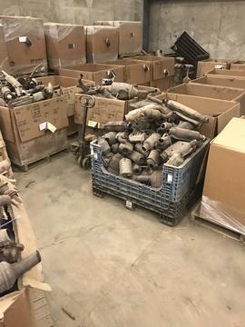 Organized Scrap Metal Collection in Warehouse Setting
