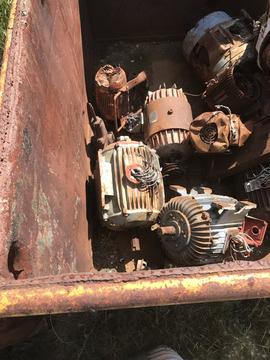 Collection of Rusted Electric Motors for Recycling
