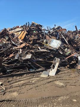 Large Pile of Scrap Metal at Recycling Facility