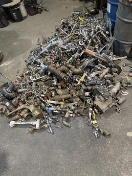 Pile of Scrap Metal Ready for Recycling at Our Facility
