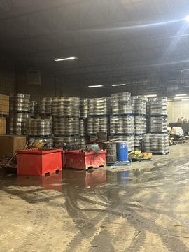 Scrap Metal Recycling Facility with Stacked Materials and Equipment