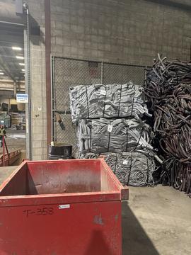 Efficient Scrap Metal Recycling Facility with Organized Bins