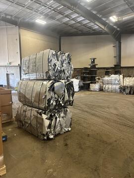 Stacked Bales of Scrap Metal in Recycling Facility