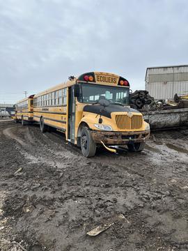 Yellow School Bus in Scrap Metal Recycling Yard