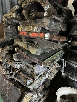 Stacked Scrap Metal Radiators Ready for Recycling