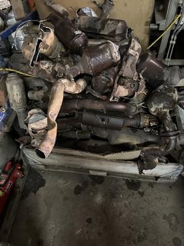 Scrap Metal Pile of Used Automotive Parts for Recycling